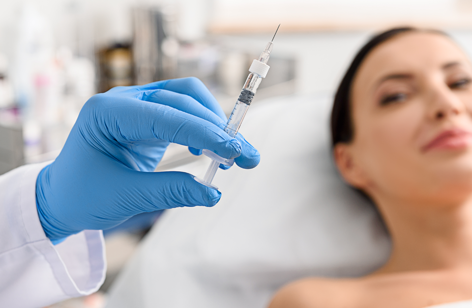 Patient receiving BOTOX injections from an injector.