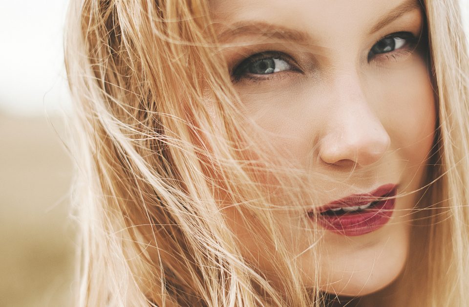 Close up of woman with smooth skin and full lips